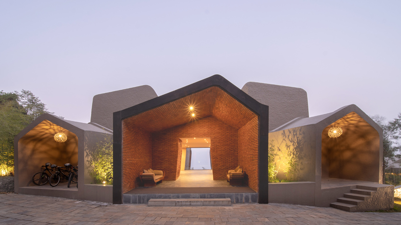 MAP's cloud catcher emerges from nepal hillside resort as two rock-like volumes