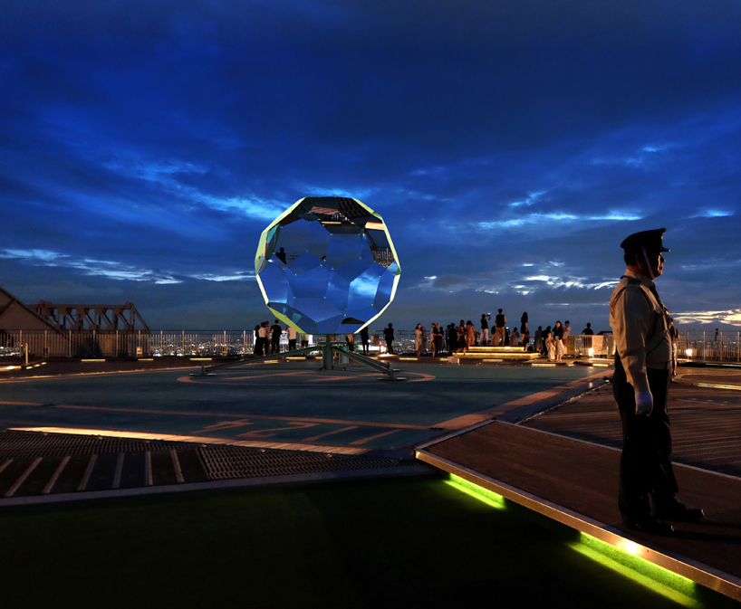 vincent leroy's geodesic 'illusion lens' installation lands on a tokyo rooftop designboom