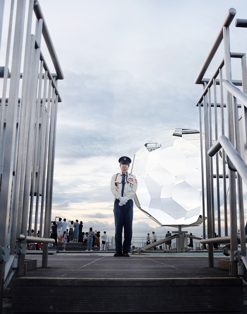 vincent leroy's geodesic 'illusion lens' installation lands on a tokyo rooftop designboom