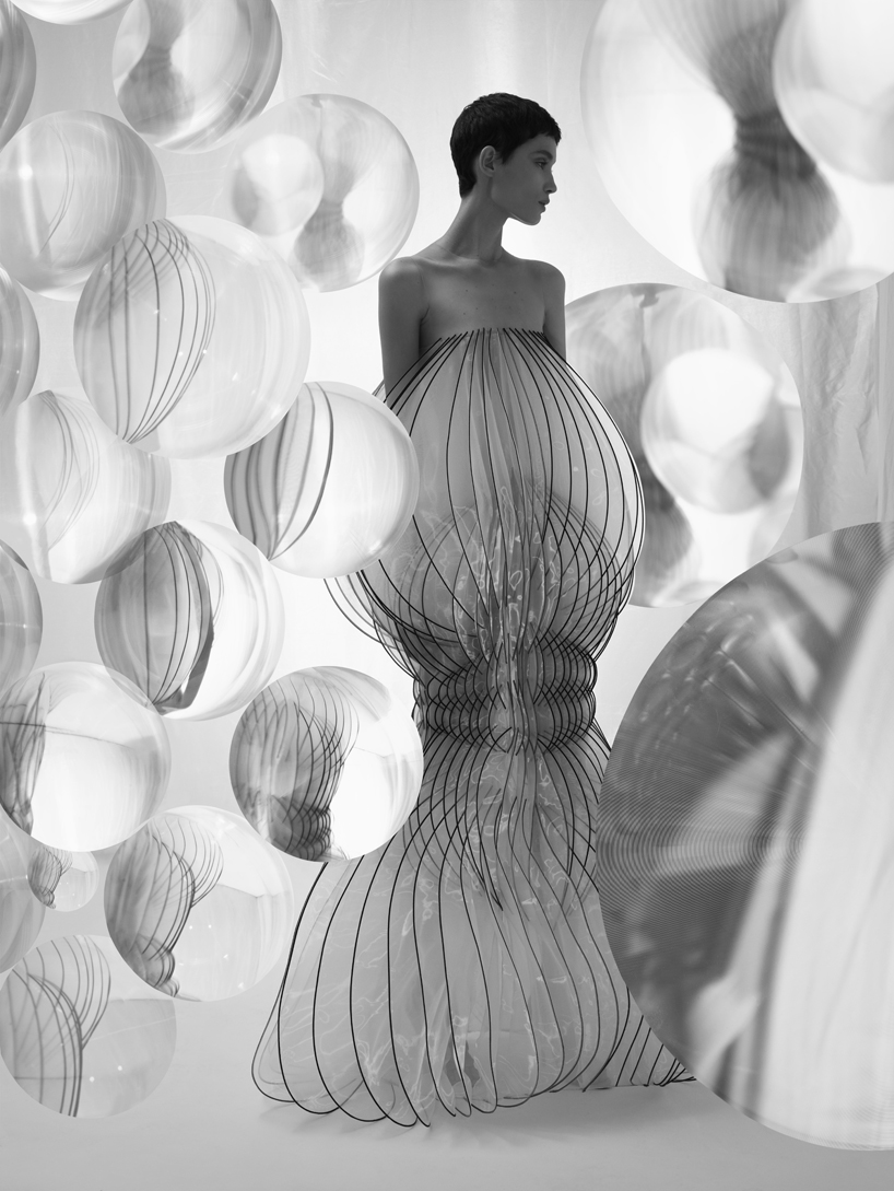 vincent leroy distorts iris van herpen's 'hypnosis' collection through a magnifying lens designboom