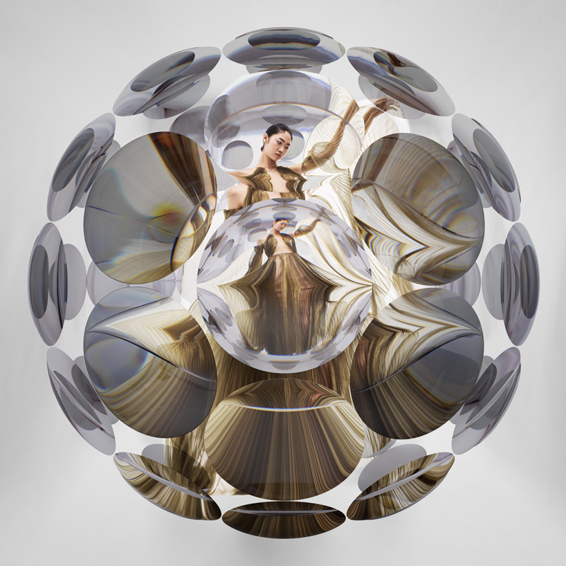 vincent leroy distorts iris van herpen's 'hypnosis' collection through a magnifying lens designboom