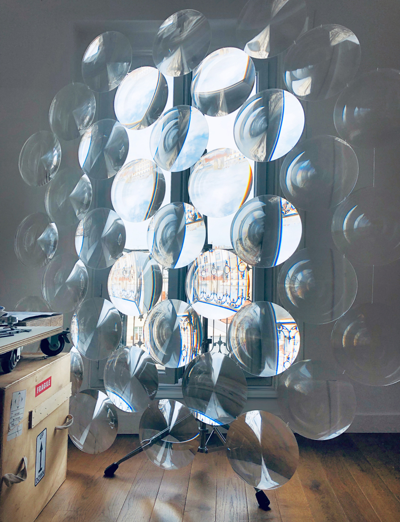 vincent leroy distorts iris van herpen's 'hypnosis' collection through a magnifying lens designboom