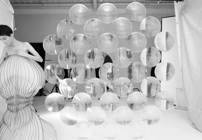 vincent leroy distorts iris van herpen's 'hypnosis' collection through a magnifying lens designboom