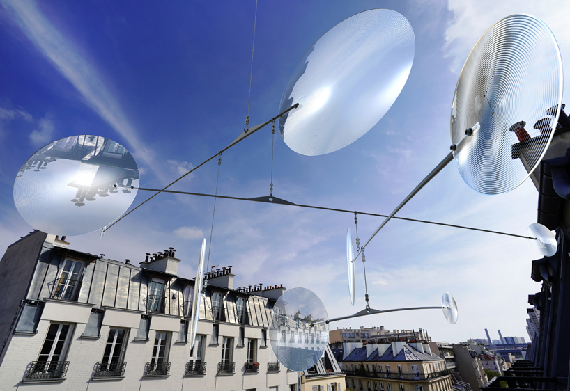 vincent leroy filters reality with 'floating lens' installation on parisian rooftops