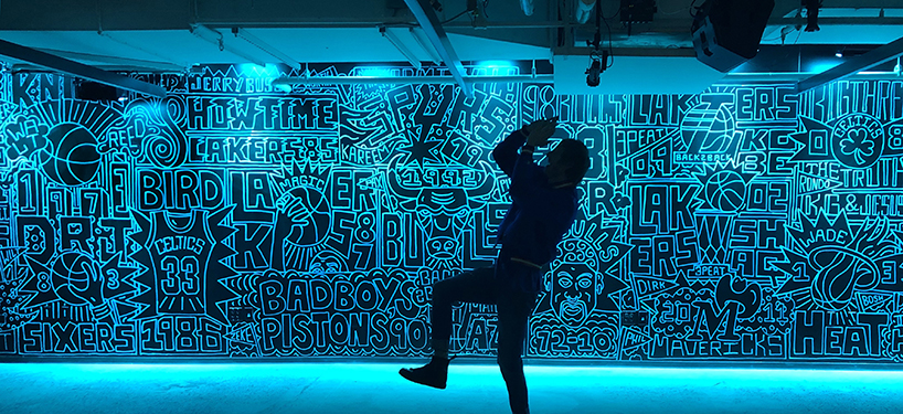 timothy goodman celebrates the top 25 greatest NBA teams with a 40 foot long mural in NYC designboom