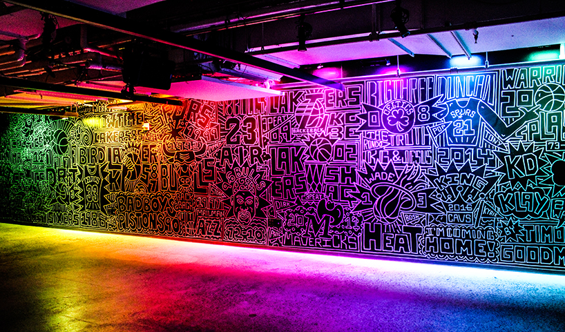 timothy goodman celebrates the top 25 greatest NBA teams with a 40 foot long mural in NYC designboom
