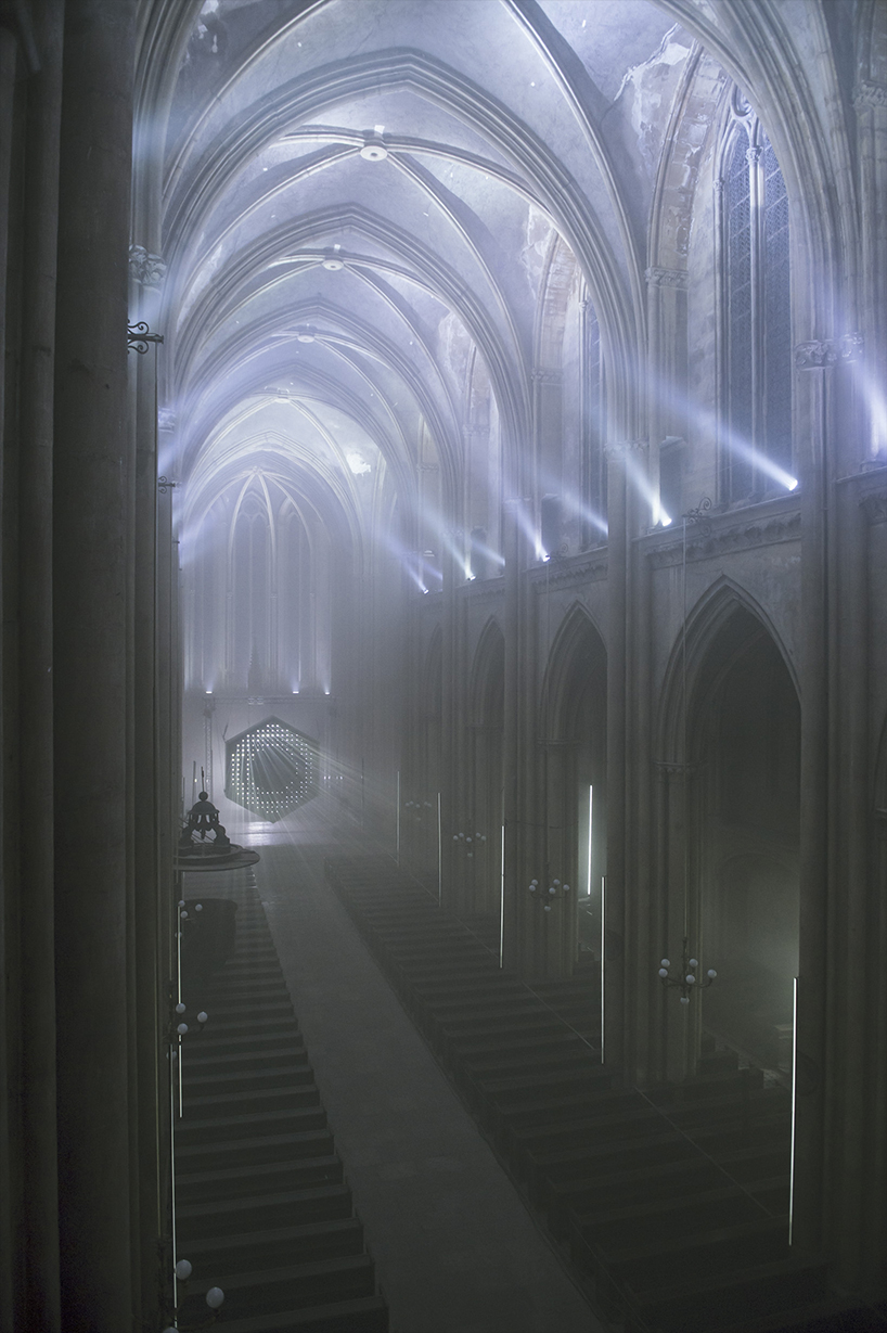 guillaume marmin illuminates a church with immersive '1.3 SECONDE' lightshow in france designboom