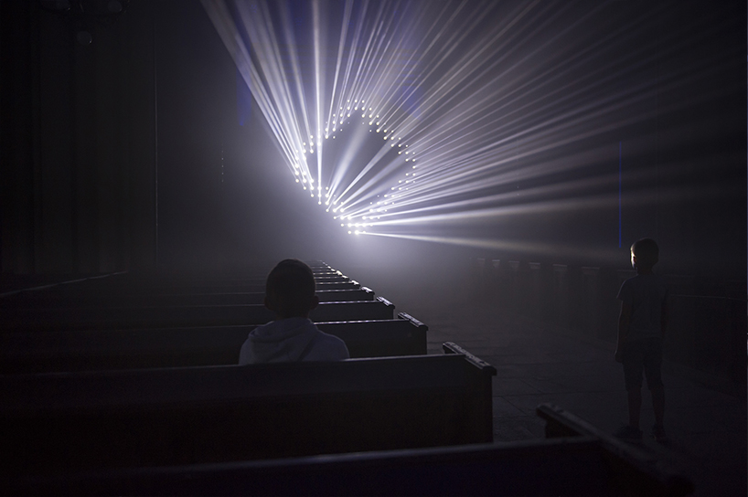 guillaume marmin illuminates a church with immersive '1.3 SECONDE' lightshow in france designboom