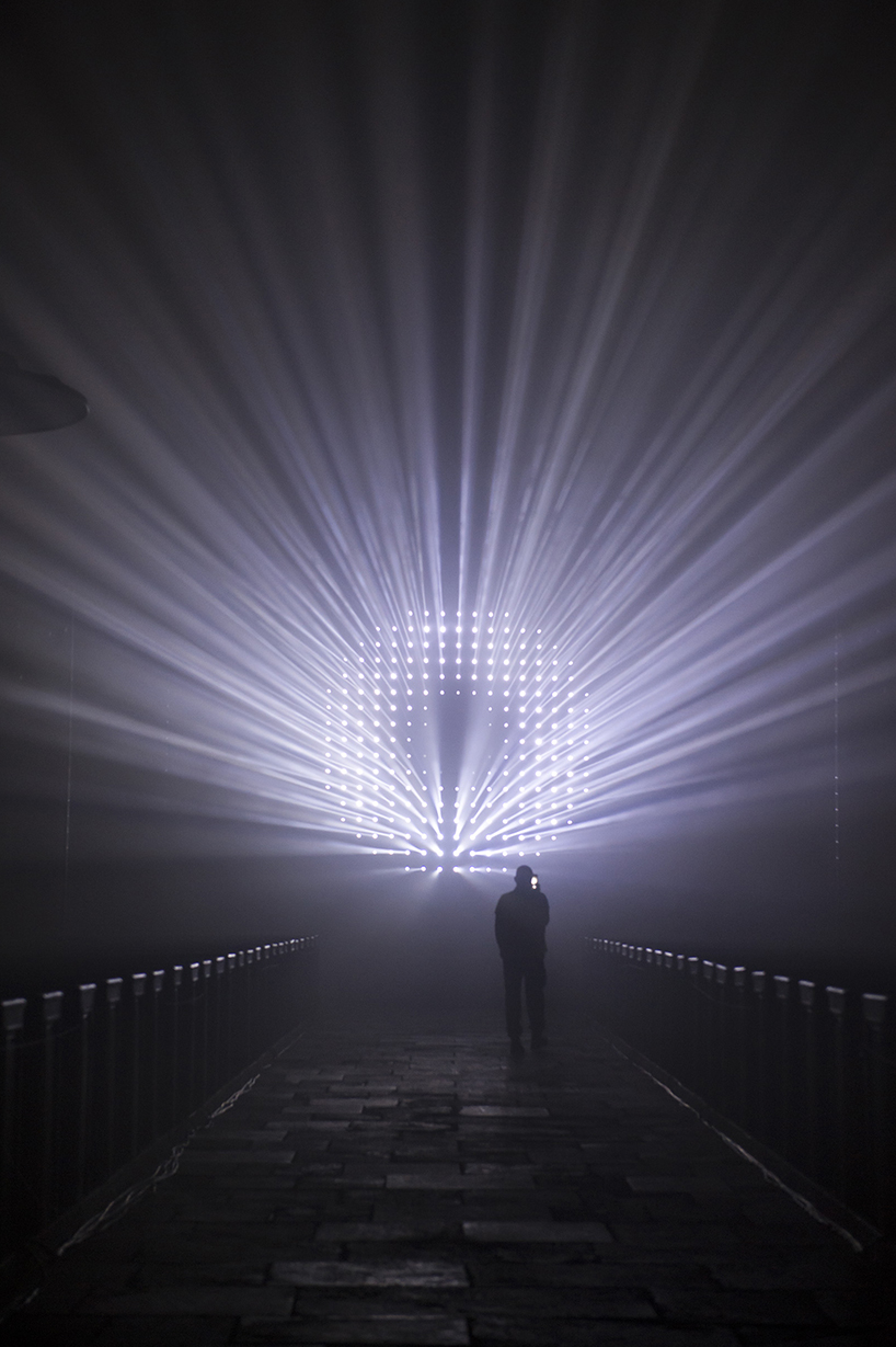 guillaume marmin illuminates a church with immersive '1.3 SECONDE' lightshow in france designboom