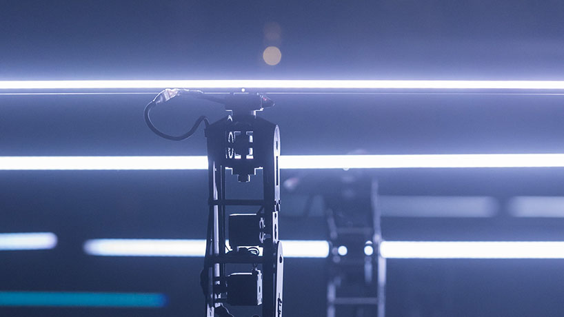 collectif scale's 'ballet of robots' makes light dance in lyon, france designboom