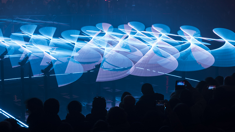 collectif scale's 'ballet of robots' makes light dance in lyon, france designboom