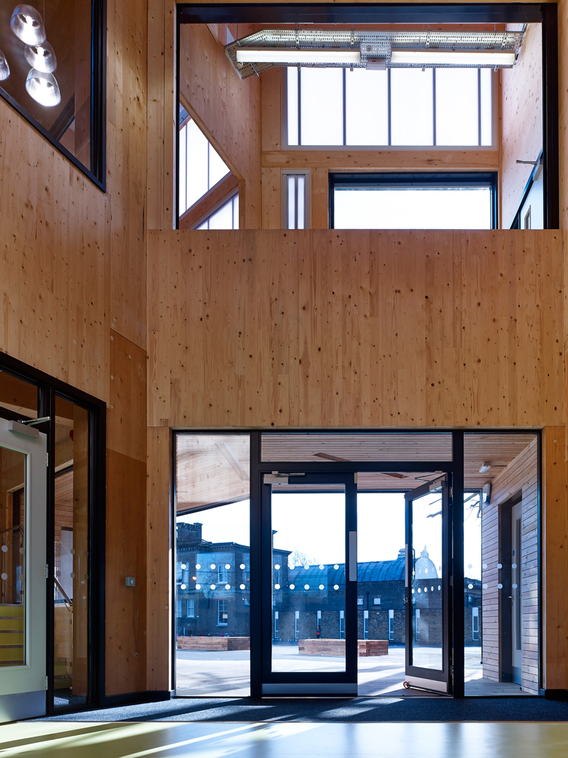 urban projects bureau clads school extension with polycarbonate paneling - 7