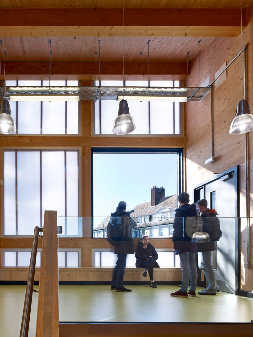 urban projects bureau clads school extension with polycarbonate paneling - 9