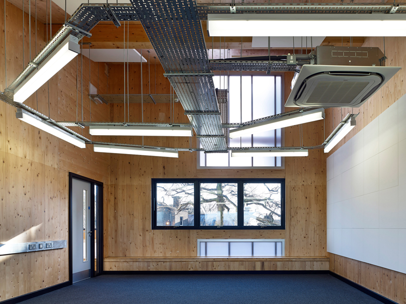 urban projects bureau clads school extension with polycarbonate paneling - 4
