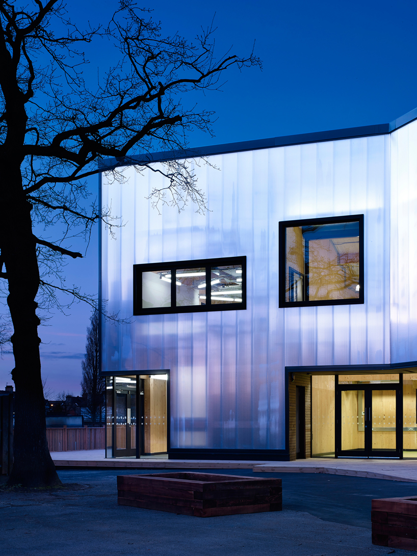 urban projects bureau clads school extension with polycarbonate paneling - 1