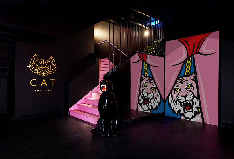 kissmiklos applies colorful illustrations to design CAT bar and dance club in budapest designboom
