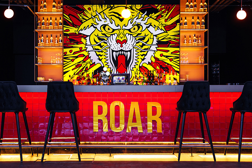 kissmiklos applies colorful illustrations to design CAT bar and dance club in budapest designboom
