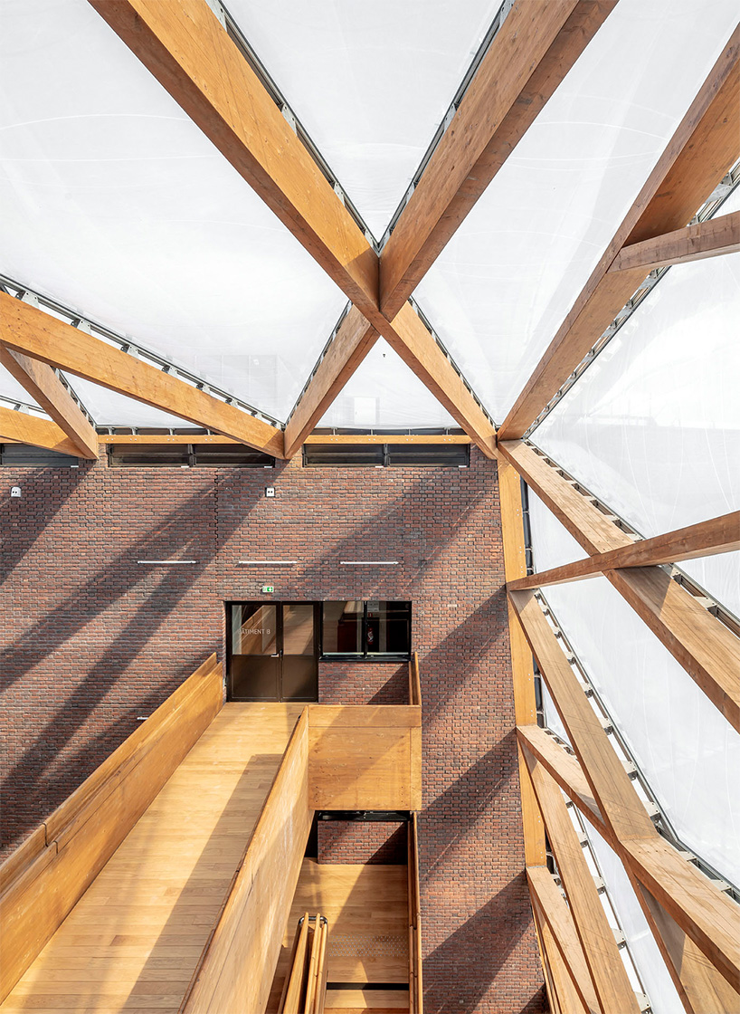 marin + trottin unites paris eco-campus islets with ETFE + triangulated wood frame crossway
