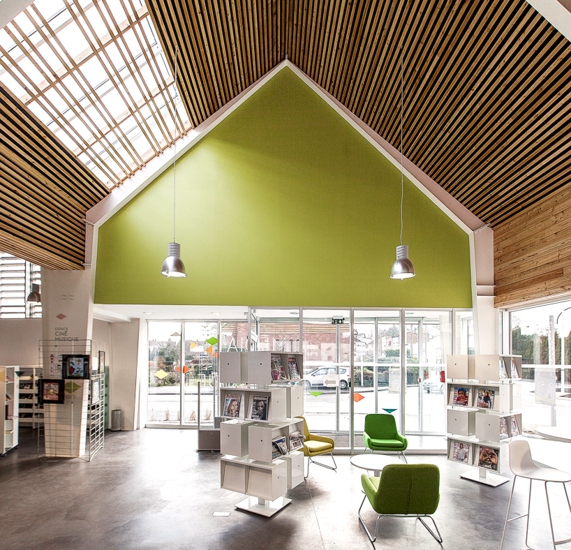 bplusb architectures adds gable-roof to dainville library