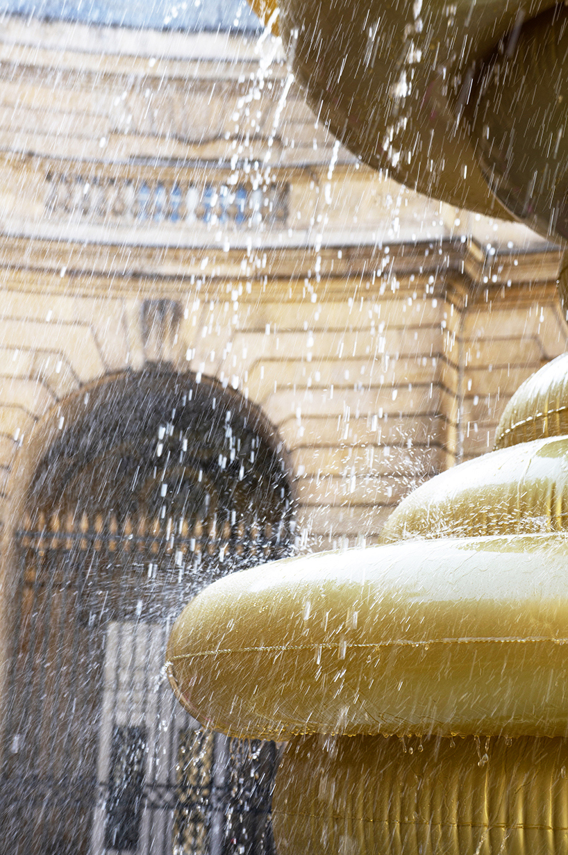 bina baitel’s gilded inflatable fountain occupies historic courtyard at monnaie de paris  