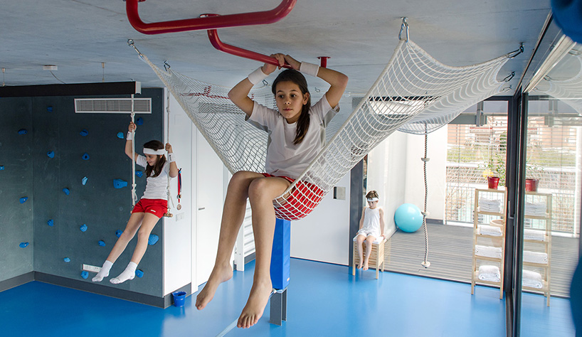 playoffice inserts children's indoor climbing gym into home