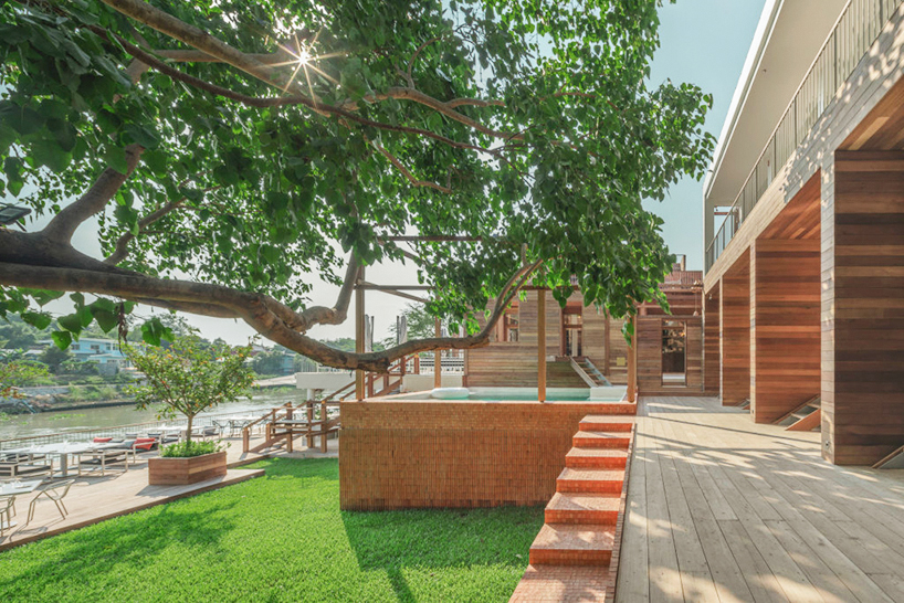 handmade bricks form the 'baan pomphet' restaurant and hotel in ayutthaya, thailand designboom