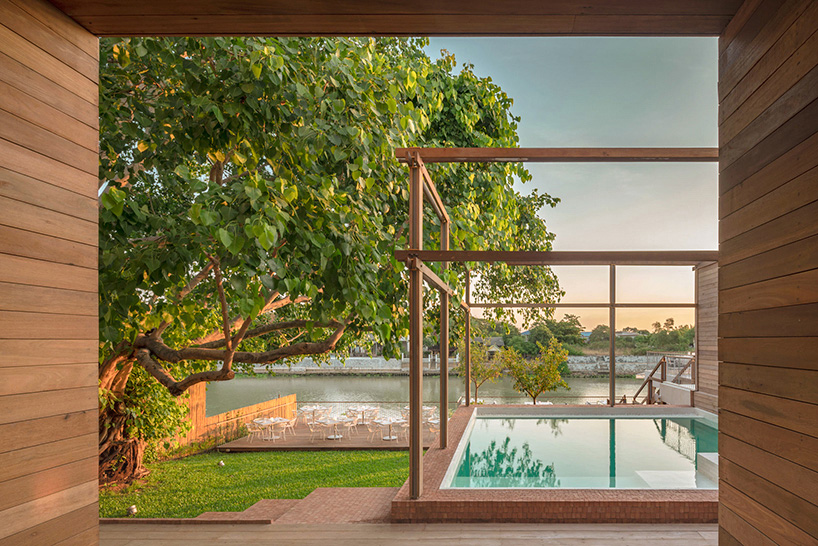 handmade bricks form the 'baan pomphet' restaurant and hotel in ayutthaya, thailand designboom