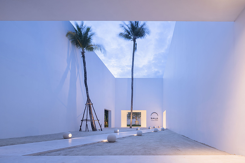 intimate courtyards form this beach resort in thailand designed by onion designboom