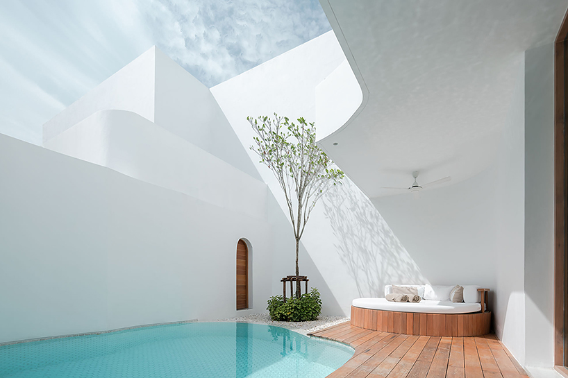 intimate courtyards form this beach resort in thailand designed by onion designboom