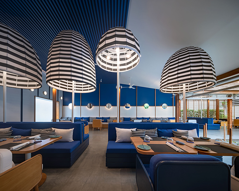 intimate courtyards form this beach resort in thailand designed by onion designboom