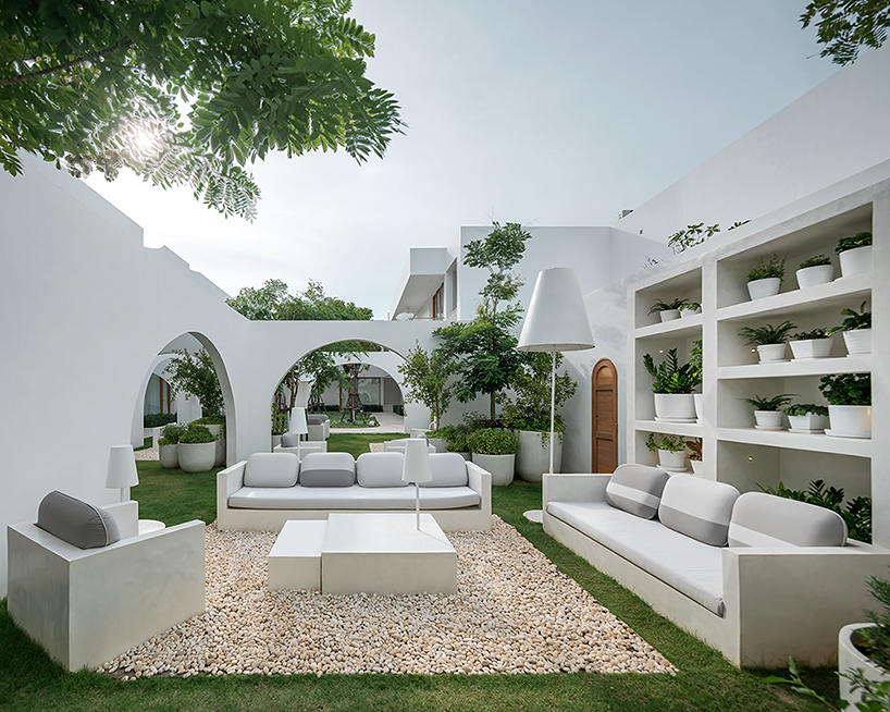 intimate courtyards form this beach resort in thailand designed by onion designboom