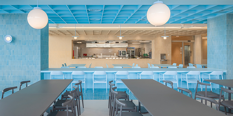 baby blue hues engulf onion's multipurpose school canteen in bangkok