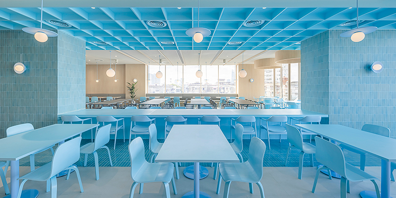 baby blue hues engulf onion's multipurpose school canteen in bangkok