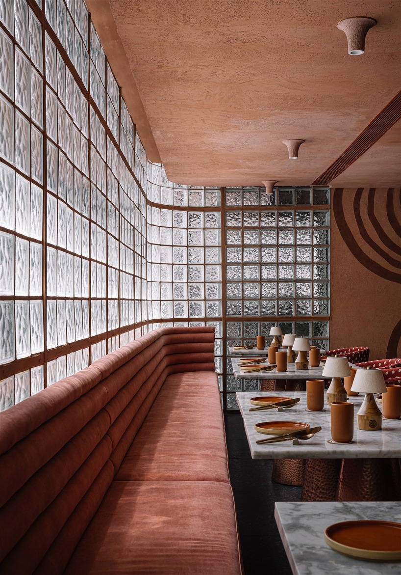 tactile earthen surfaces capture essence of jaipur at purple ink studio's idyll restaurant in bengaluru