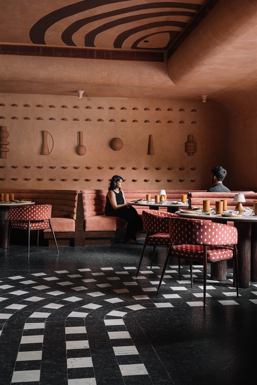 tactile earthen surfaces capture essence of jaipur at purple ink studio's idyll restaurant in bengaluru