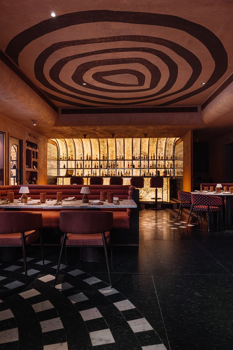 tactile earthen surfaces capture essence of jaipur at purple ink studio's idyll restaurant in bengaluru