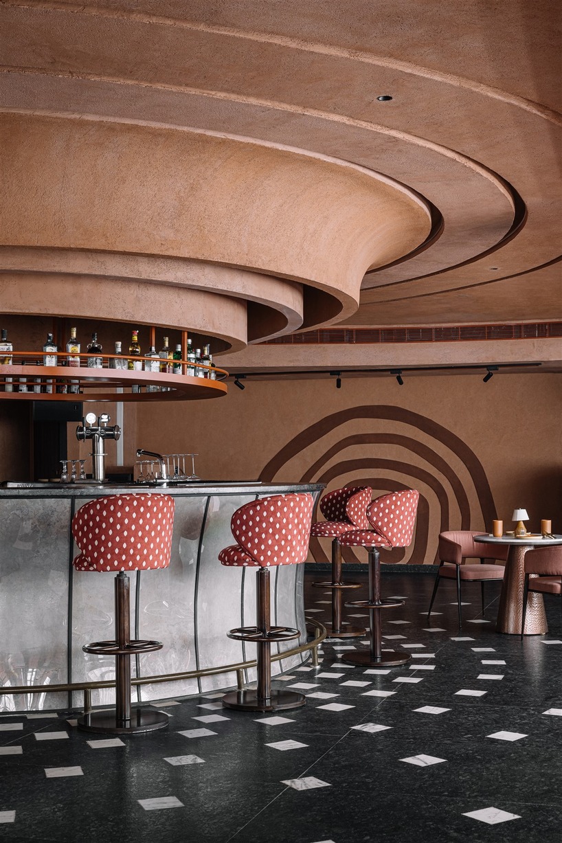 tactile earthen surfaces capture essence of jaipur at purple ink studio's idyll restaurant in bengaluru