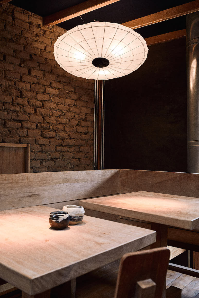 ghezzi novak and blanco use natural materials in cozy restaurant interior, lima
