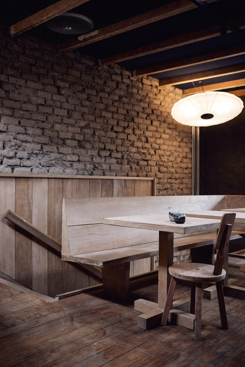 ghezzi novak and blanco use natural materials in cozy restaurant interior, lima