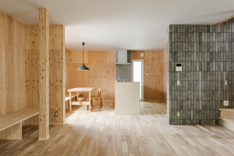 double-level foyer puts modern twist on traditional doma in coil Kazuteru Matumura Architects' re:teramoto house in itama