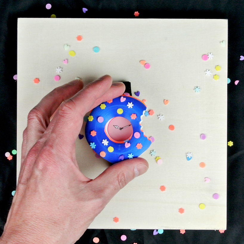 paul kweton's quirky donut watches playfully teach children the ways of timekeeping
