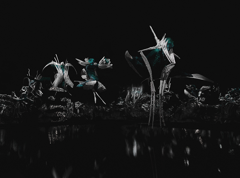 sruli recht's abyssicide 'garments for drowning in' metamorphose water into coral on skin