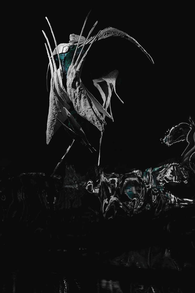 sruli recht's abyssicide 'garments for drowning in' metamorphose water into coral on skin