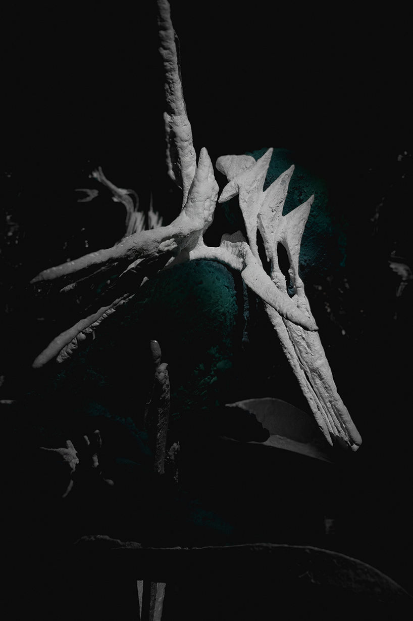 sruli recht's abyssicide 'garments for drowning in' metamorphose water into coral on skin