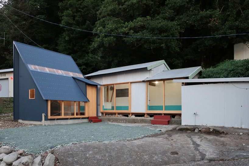 TD atelier's self-build fishing factory in japan with distinctive triangular roof