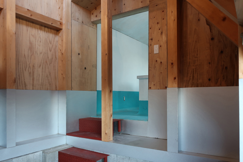 TD atelier's self-build fishing factory in japan with distinctive triangular roof