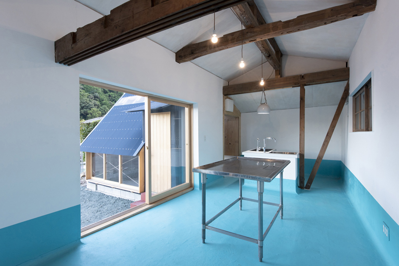 TD atelier's self-build fishing factory in japan with distinctive triangular roof
