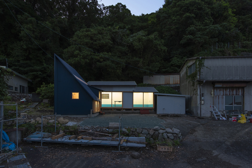 TD atelier's self-build fishing factory in japan with distinctive triangular roof