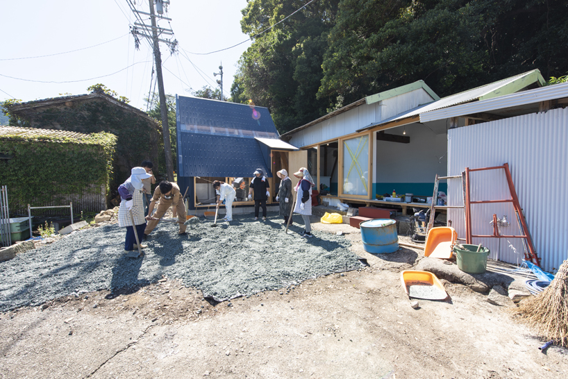 TD atelier's self-build fishing factory in japan with distinctive triangular roof