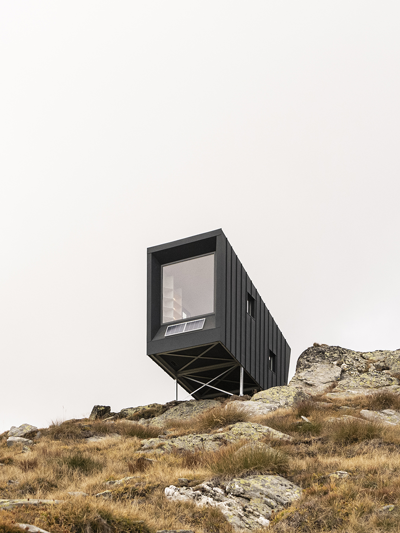 bcw collective cantilevers a bivouac hut above italian alpine valley 5